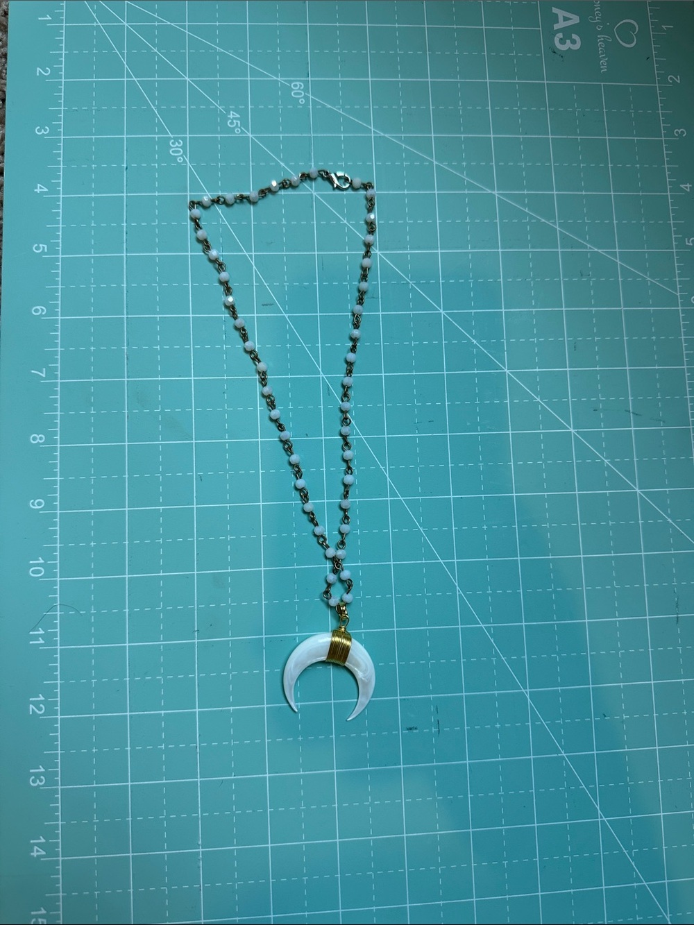 Crescent Horn Pendant Necklace in White and Gold